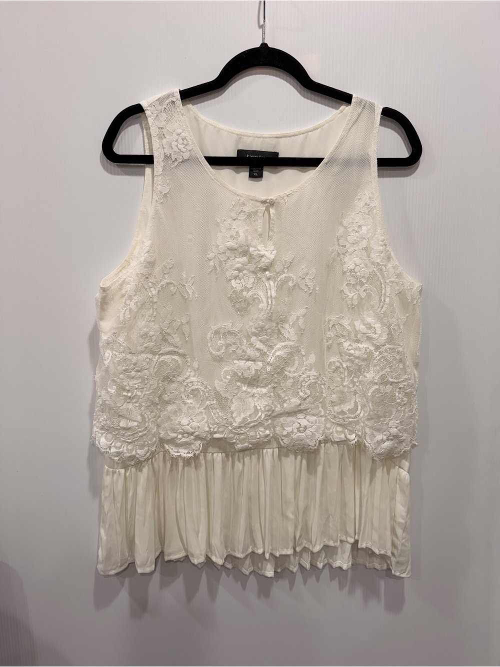 Karen Kane sleeveless lace peplum top